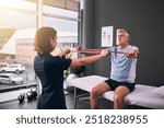 Physiotherapist, senior man and band for stretching at clinic, rehabilitation and specialist for help. Woman, chiropractor and patient for injury consultation, orthopedic and support with treatment