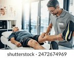 Physiotherapist, senior man and stretching leg for knee pain, medical and consultant with injury support. Consultation, chiropractor and physical therapy with rehabilitation and care in doctor office