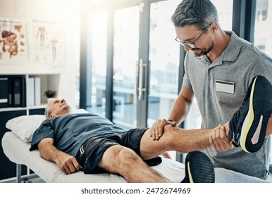 Physiotherapist, senior man and stretching leg for knee pain, medical and consultant with injury support. Consultation, chiropractor and physical therapy with rehabilitation and care in doctor office - Powered by Shutterstock