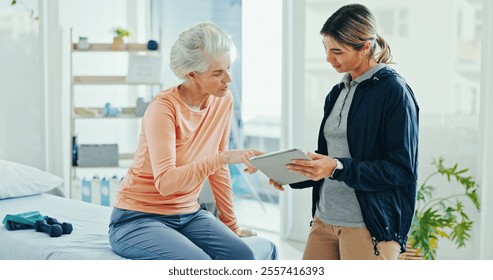 Physiotherapist, senior woman and tablet for talking at clinic with report, progress and consulting for recovery. People, doctor and patient with digital touchscreen, reading and results at hospital - Powered by Shutterstock