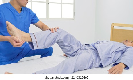 A physiotherapist who performs rehabilitation. Massage. - Powered by Shutterstock