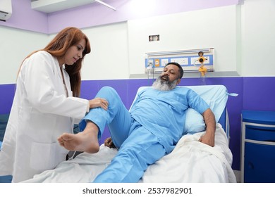 Physiotherapist working with patient in clinic, physical rehabilitation, doctor giving advice to patient Ankle problems and flexor injuries. Indian Physiotherapist Helping Patient  - Powered by Shutterstock