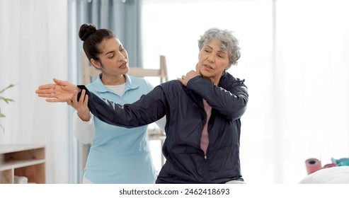 Physiotherapy, arm and senior woman consulting physiotherapist for injury, healthcare and osteoporosis. Chiropractor, stretch or old person with pain, shoulder and rehabilitation with medical problem - Powered by Shutterstock