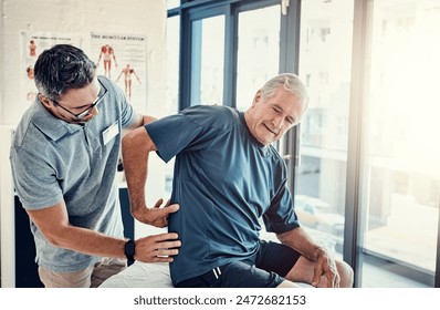 Physiotherapy, chiropractor and elderly man with back pain for rehabilitation, consulting and exercise. Healthcare, physical therapy and person with patient for medical service, wellness and support - Powered by Shutterstock