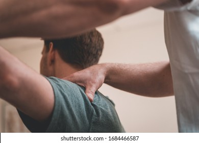 Physiotherapy Doing Treatment For Various Physical Ailments On Patient