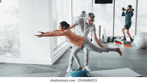 Physiotherapy, girl and personal trainer in gym for balance, rehabilitation and stability training. Man, woman and half ball in fitness center for core strength, yoga practice and help in exercise - Powered by Shutterstock