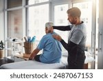 Physiotherapy, shoulder pain and person with senior man for medical care, consulting and wellness. Chiropractor, healthcare and physical therapist and client for rehabilitation, massage or assessment