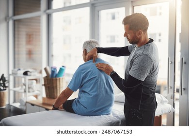 Physiotherapy, shoulder pain and person with senior man for medical care, consulting and wellness. Chiropractor, healthcare and physical therapist and client for rehabilitation, massage or assessment - Powered by Shutterstock