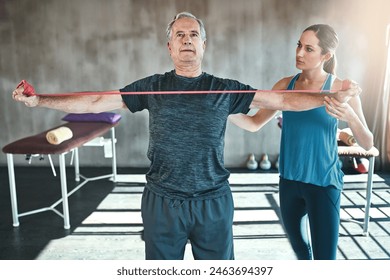 Physiotherapy, stretching and senior man with resistance band for training, exercise or workout. Physical therapy, gym and physiotherapist with equipment for person for wellness, health or wellbeing - Powered by Shutterstock