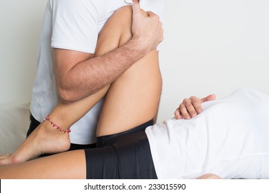 physiotherapy treating female leg