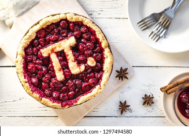 Pi Day Cherry Pie - Homemade Traditional Cherry Pie with Pi sign for March 14th holiday.
