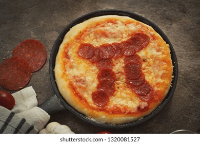 Pi Day Pepperoni Pizza Overhead View