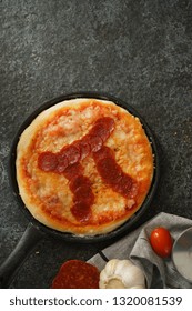 Pi Day Pepperoni Pizza Overhead View