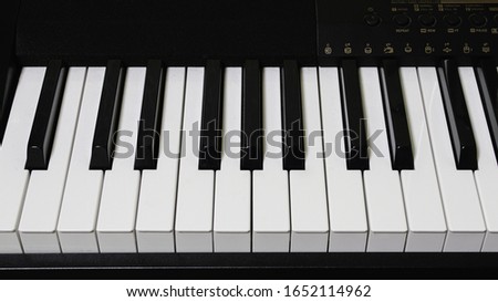 Piano and black and white keys