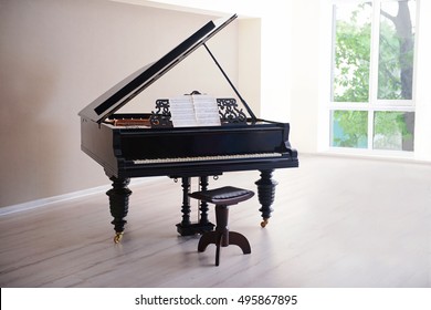 Piano in empty classic room