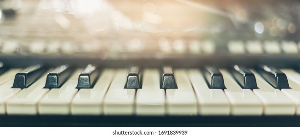 Piano keyboard background was set up in the music room by the windows in the morning to allow the pianist to rehearse before the classical piano performance in celebration of the great success. - Powered by Shutterstock