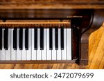 Piano keys from above on wood vintage piano