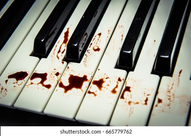 Piano keys and blood, dangerous