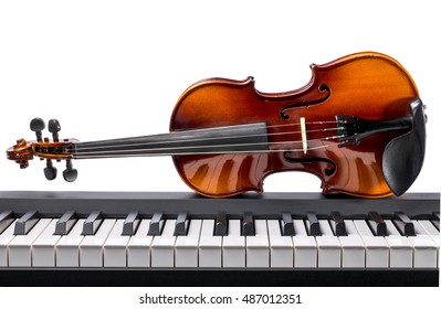 Piano keys and violin on a white background           