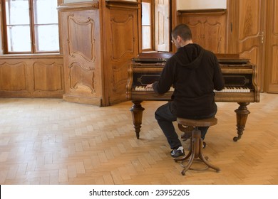 Piano Player In Old Castle