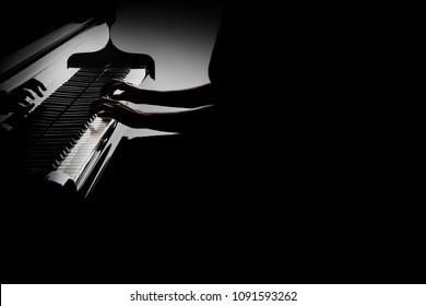 Piano Player. Pianist Hands Playing Grand Piano Closeup Isolated On Black Background