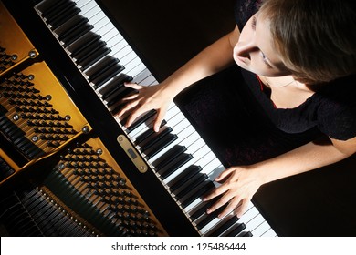 Piano Playing Pianist Player. Woman With Musical Instrument Closeup