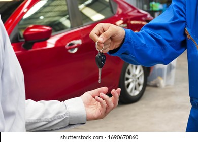 Pick Up The Car Keys From The Mechanic After The Check Is Complete.