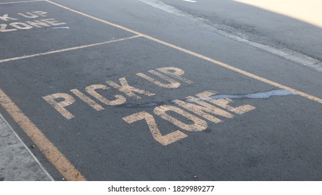 Pick Up Zone Sign At The Airport Terminal, Yellow Pickup Sign 