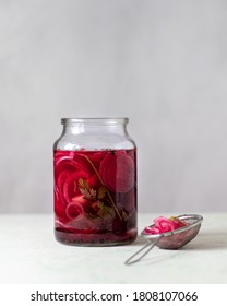 Picked Red Onions In A Jar