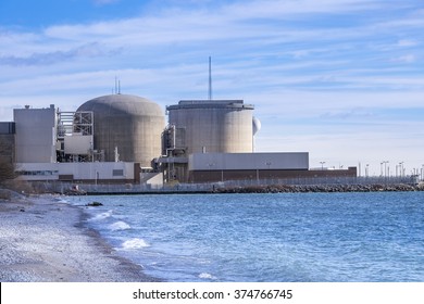 Pickering Nuclear Generating Plant, As Seen From The Shore Of Lake Ontario, Is Located In  Pickering A City Just Outside Of Toronto Canada.