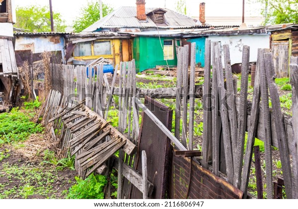 the picket fence has\
decayed and the old fence between the two sites has collapsed,\
selective focus