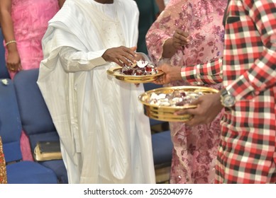 Picking Communion Cups From Tray