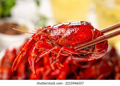 Picking Up Crawfish Tail With Chopsticks