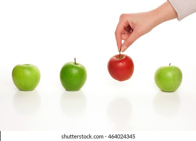 Picking Different Apple Among Similar On White