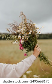 Picking wild flowers in the fields