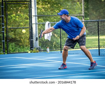 Pickleball Instructor demonstrates the backhand volley.tif