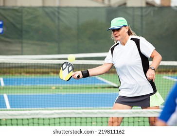 Pickleball Player On An Outside Court