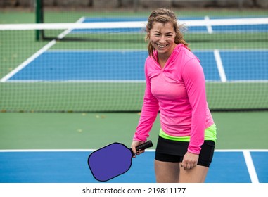 Pickleball Player On An Outside Court