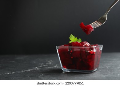 Pickled Beets And Fork Over Glass Bowl On Dark Marble Table, Space For Text