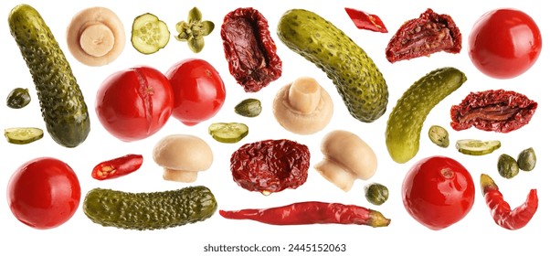 Pickled champignons, cucumbers, tomatoes, capers, chili pepper and sun dried tomatoes isolated on white background. Collection with clipping path. - Powered by Shutterstock