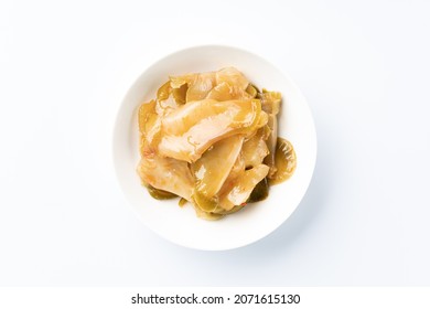 Pickled Chinese cai on white background.