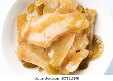 Pickled Chinese cai on white background.