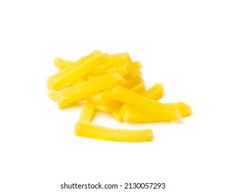 Pickled daikon bars isolated. Marinated yellow radish, sliced daikon pickles, fermenting vegetables pieces, tsukemono, danmuji or takuan on white background