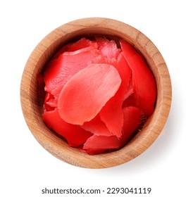 Pickled ginger in a wooden plate close-up on a white background. Top view - Powered by Shutterstock