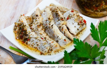 Pickled Herring In Homemade Marinade Of Olive Oil, Vinegar, Sea Salt With Spices And Onion