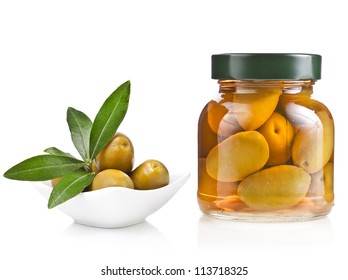 pickled olives and olive tree branch isolated on a white background - Powered by Shutterstock