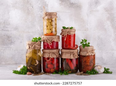 Pickled vegetables in glass jars. - Powered by Shutterstock