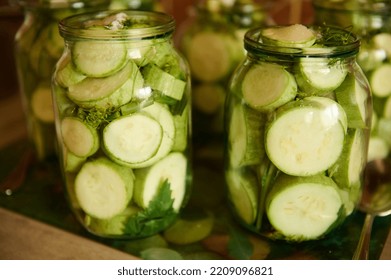 Pickling. Canning. Marinating. Preserving Homegrown Vegetables For The Winter. Organic Sliced Zucchini, Courgettes, Or Vegetable Marrows, Marinated In Brine, Salt, Or Vinegar. Home Canned Food