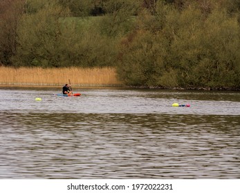 Pickmere Lake, Pickmere, Knutsford, Cheshire, UK. 24th April 2021. Open Water Swimmer Group Taking Part In Organised Open Water Swimming Training, Pickmere, Knutsford, Cheshire, Uk