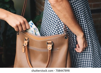 Pickpocket Thief Is Stealing Money From Woman Leather Handbag